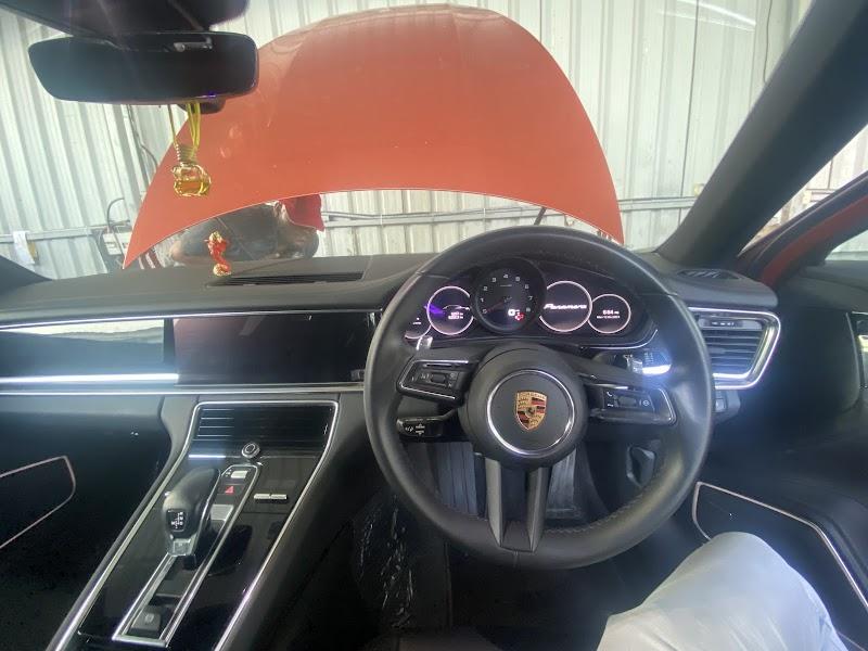 Porsche cabin with digital cockpit and custom interior trim by V8Hub
