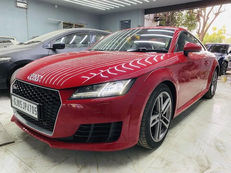 Red Audi TT coupe after paint correction and ceramic coating at V8Hub